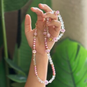 A Beautiful necklace and Bracelet set made with Pinck pearl and white crystal